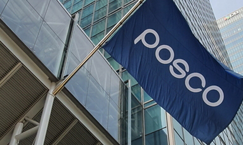 A blue POSCO flag outside a building