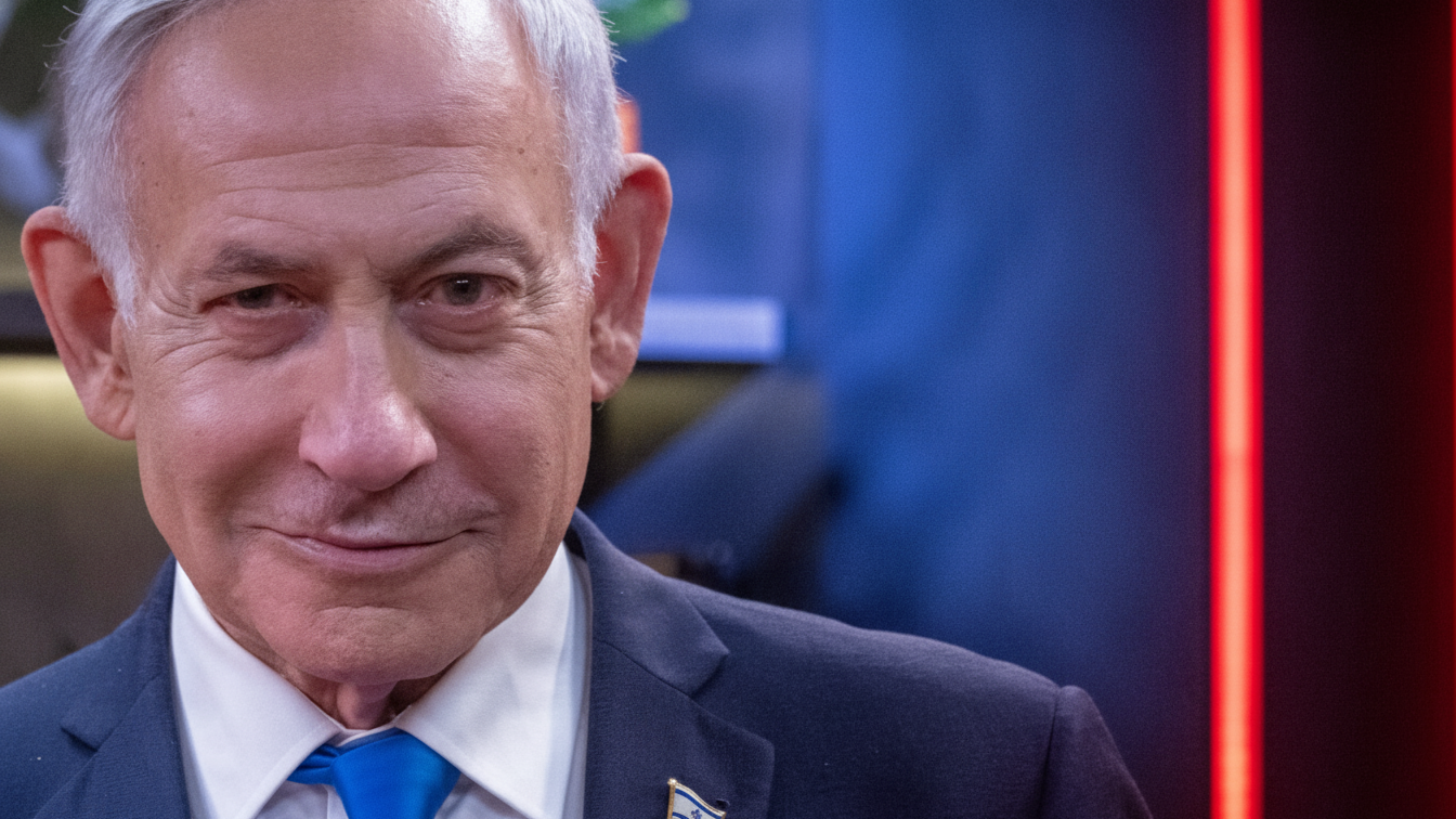 Israeli Prime Minister Benjamin Netanyahu looking toward the camera during an interview.